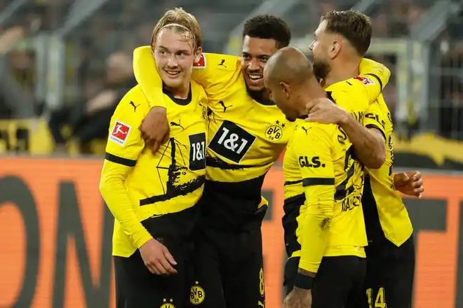 爱游戏入口-拜仁慕尼黑大胜多特蒙德，领跑德甲积分榜的简单介绍